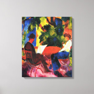 Par vid trädgårdsbordet av August Macke Canvastryck
