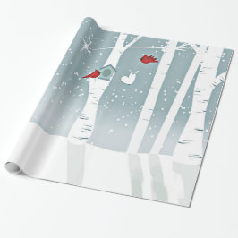 Para av röda huvudsakliga fåglar i snöig skogen presentpapper