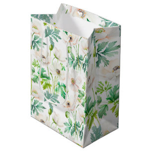 Pärlande vita anemonblommor på grädde