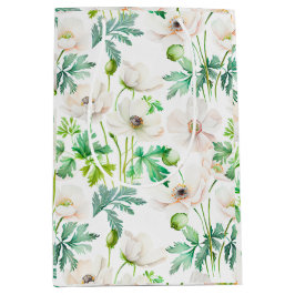 Pärlande vita anemonblommor på grädde