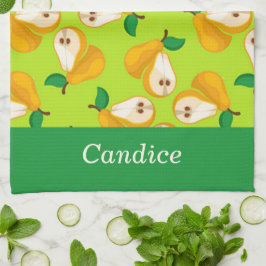 Päron för orange av eget namn på grönt kökshandduk