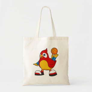 Parrot som basketspelare med basketboll tygkasse