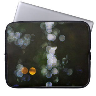 Parti av plastbehållare av färg som tillsatts laptop fodral