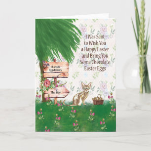 Påsk-kort med katt som levererar chokladägg helgkort