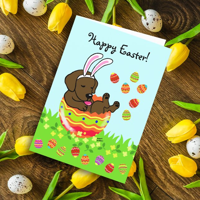 Påskägg Chocolate Labrador Puppy Tecknad Helgkort (Easter Egg Chocolate Labrador Puppy card featuring cute Labrador Cartoon in the colorful Easter egg.)