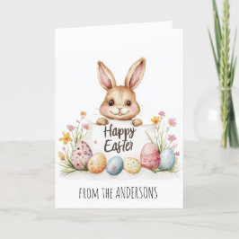Påskägg och söt kanin i bakgrunden helgkort
