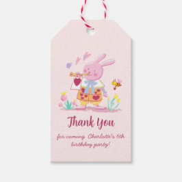 påskhare för rosa i trädgård presentetikett