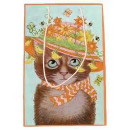 Påskkatt i påskhätta med fjärilar