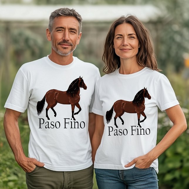 Paso Fino Horse Illustration Equestrian Tröja (White t-shirt with Paso Fino horse illustration and bold text “Paso Fino,” modeled by man and woman,)