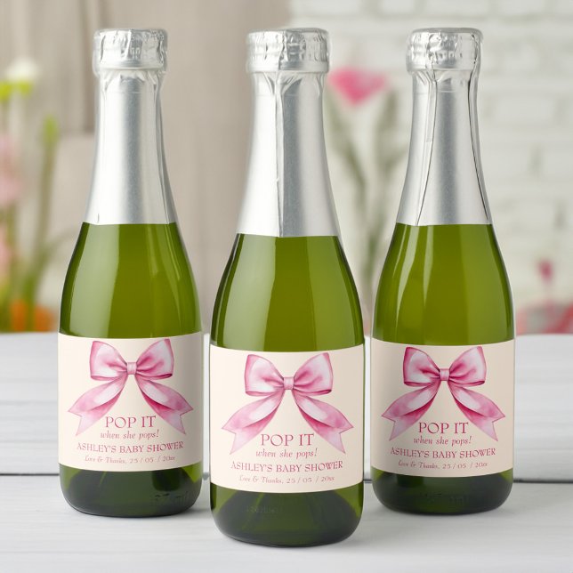 Passa det när hon doppar rosa-buskduschen. (Pop it when she pops pink bow ribbon baby shower  favors sparkling wine label mini champagne labels)