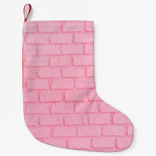 Pastel rosa brick bakgrundsvägg struktur. rosa liten julstrumpa
