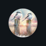 Pastel Watercolor Birds Fencepost Sunset Magnet<br><div class="desc">Soft watercolor brushwork captures two fluffy songbirds resting on weathered fence posts as a glowing sunset spreads across a dreamy countryside sky. Gentle washes of peach, blush pink, pale blue, and warm gold blend into a tranquil horizon, creating a calm pastoral atmosphere. The birds appear round and feathery, their delicate...</div>