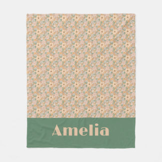 Pastellbeige blommönster namn fleecefilt