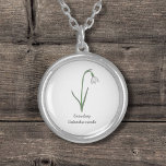 Pastellblomma, mosthölje silverpläterat halsband<br><div class="desc">En Necklace med en botanisk Snödroppbild i Pastel färg och en anpassade: perfekt för en födelsedagspresent. Det är den första blomman från januari och blomman från Capricorn.</div>