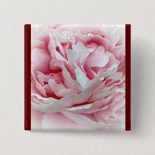 Pastellfärgad blomma knapp