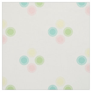 Pastellfärgad polka dots på vit tyg