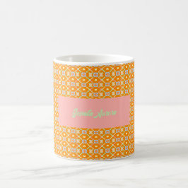 Pastellgeometriskt pixelmönster på levande orange kaffemugg