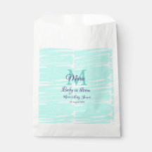 Pastellgrön baby i blommonogram baby shower te