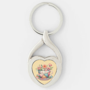 Patchwork Tekopp med Whimsical Flowers Twisted Heart Silverfärgad Nyckelring