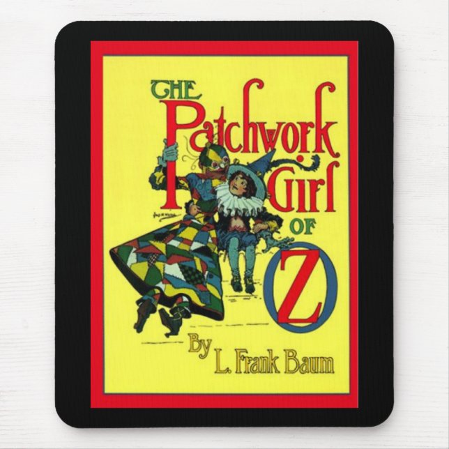 Patchworkflickan av uns musmatta (Framsidan)