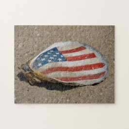 Patriotiskt amerikanskt flaggostronsskal på strand pussel