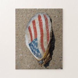 Patriotiskt amerikanskt flaggostronsskal på strand pussel