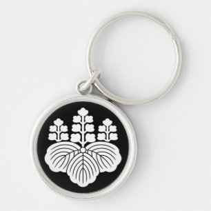 Paulownia med 5-7 blommor rund silverfärgad nyckelring