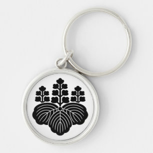 Paulownia med 5-7 blomningar rund silverfärgad nyckelring
