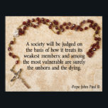 Påven Johannes Paul II Quote Poster<br><div class="desc">Ett samhälle kommer att bedömas utifrån hur det behandlar sina svagaste medlemmar,  och bland de mest sårbara är säkerligen de ofödda och de döende.</div>