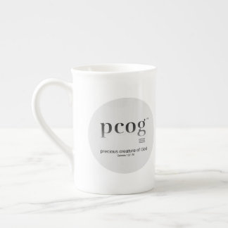 pcog-akronym; rund hel msg; svart-vit färg; benporslin mugg