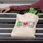 Peace Kärlek Bananas Tygkasse<br><div class="desc">Peace Kärlek Bananas. En söt banangåva från älskare med ett fredstecken och hjärta bredvid gulten frukt.</div>
