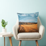 Peaceful Summer Landscape Golden Wheat Kudde<br><div class="desc">Add a cozy and artistic touch to your sofa or bed with this charming throw pillow. The design showcases a graphic,  posterized summer landscape featuring a peaceful dirt path wandering through golden fields. Its warm color palette and stylized aesthetic make it an ideal home decor accent for nature lovers.</div>