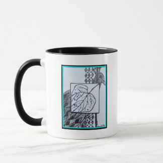 Peacock & Leaf Blk & Whit Ink Turquoise Border. Mugg