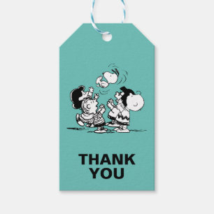 Peanuts Gang Lifts Snoopy Presentetikett