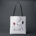 Peanuts | Snoopy & Woodstock Red & Black Tygkasse<br><div class="desc">Bring the timeless charm and heartfelt friendship of Peanuts' Snoopy and Woodstock into your life with this delightful collection, featuring their iconic red flower moment. This classic illustration captures Woodstock sweetly presenting a flower to his best pal, making every item in this collection a pure joy to own or gift!...</div>