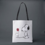 Peanuts | Snoopy & Woodstock Red & Black Tygkasse<br><div class="desc">Bring the timeless charm and heartfelt friendship of Peanuts' Snoopy and Woodstock into your life with this delightful collection, featuring their iconic red flower moment. This classic illustration captures Woodstock sweetly presenting a flower to his best pal, making every item in this collection a pure joy to own or gift!...</div>