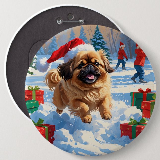 Pekingeserhund springer i snö med julhatt knapp (Framsida & baksida)