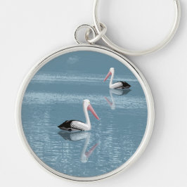 Pelican par Paddling på Lugn Blue Vatten Rund Silverfärgad Nyckelring