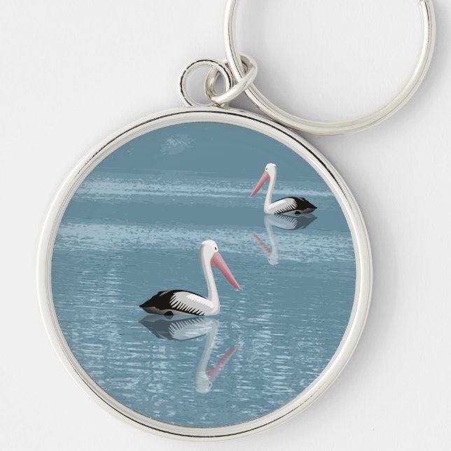 Pelican par Paddling på Lugn Blue Vatten Rund Silverfärgad Nyckelring (Framsidan)