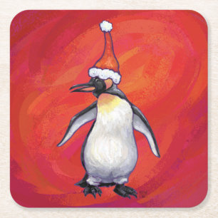 Penguin i Santa Hat på Red Underlägg Papper Kvadrat