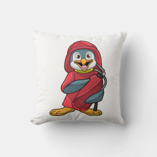 Penguin som brandman med brandsläckare kudde