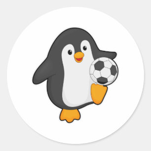 Penguin som fotbollsspelare med fotboll runt klistermärke