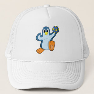 Penguin som handbollsspelare med handboll keps