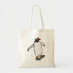 Penguin vid isfiske med isskiffer tygkasse