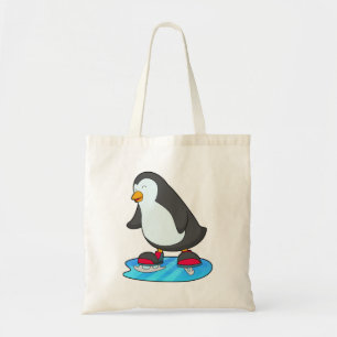 Penguin vid isfiske med isskiffer tygkasse