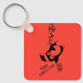 Penguine distributing christmas gifts nyckelring