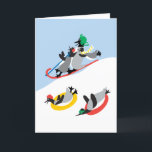 Penguins Sleding Anpassningsbar Card Helgkort<br><div class="desc">Bara ren roligt! En snöbild av pingviner som sjunger. Det är förtjusande! Den ursprungliga designen av konstnären,  Dart-dart,  är så mycket nyfiken och glad. Kortet kan anpassas. Du kan byta insidan av hälsning till spelar ingen roll som du vill.</div>
