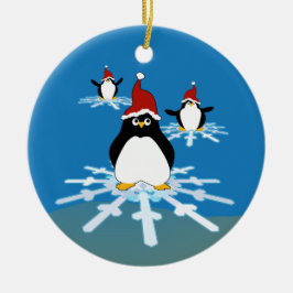 Penguins som flyger på en snöflinga julgransprydnad keramik