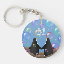 penguinvänner som ser på bubblor i monogrammet