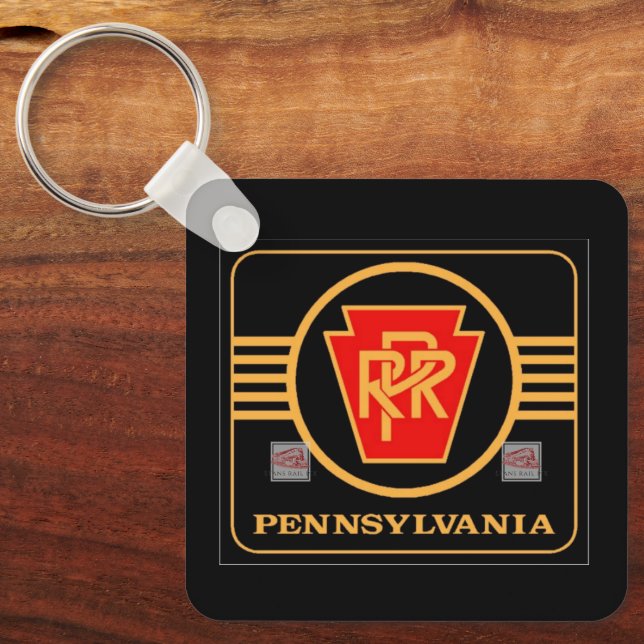Pennsylvanias rälväg, svart och guld logotyp nyckelring (Framsida)